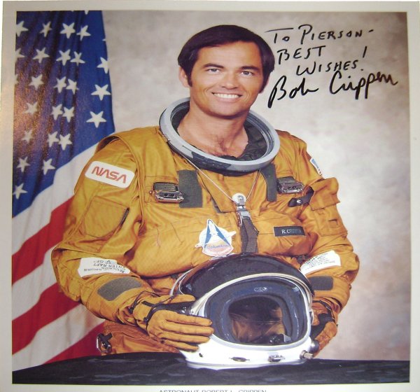 STS 1 Astronaut Robert Crippen Autograph: on a color lithograph (8 x 10") of the astronaut in his space suit. Crippen has signed in black Sharpie and inscribed the piece "To Pierson-Best Wishes ! Bob Crippen".