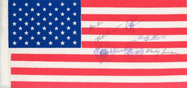 STS 91 FLOWN US Flag Crew Autographed: A nylon flag (9.5 x 4.5") flown aboard and signed by the full crew of STS-91. The flag bears STS-91 and MIR onboard cancels. Signed in black ink. Very good condition. Flown in Space? YES