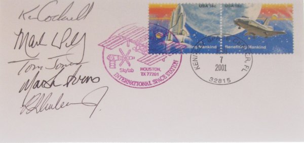 STS 98 Launch Cover Crew Autographed: on a launch cover with KSC hand cancel dated February 7th, 2001, plus postal ISS cachet (from Houston). Franked with matching Space Shuttle stamps. Cockrell, Jones and Curbeam signed in black ink and 