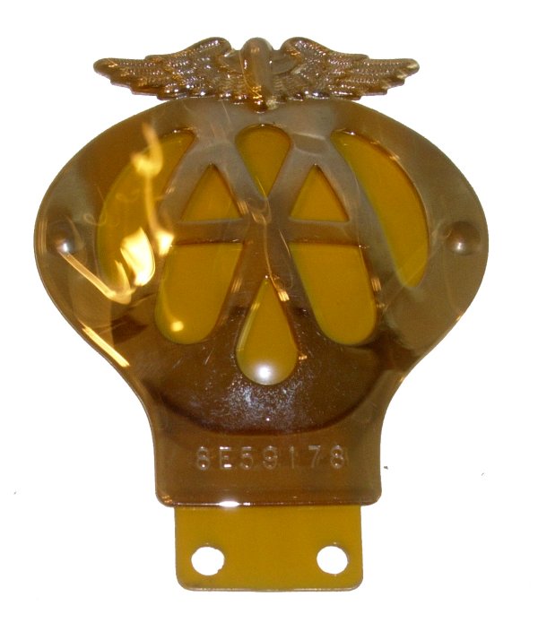 GB Automobile Assn Car Badge #8E59178 Circa 1966: The AA was originally formed to warn members of police speed traps. To enable the AA lookouts to identify and warn members, a badge was created to be mounted on the front of the car. Members were char