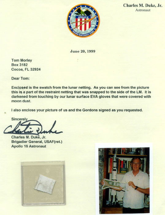 Duke Autograph & Flown Fragment of Safety Netting: Duke Autograph & Flown Fragment of Safety Netting with Lunar Material. A swatch (approx 3/4" square) of safety netting used on the lunar surface aboard the Orion. It is enclosed in a small plastic pou