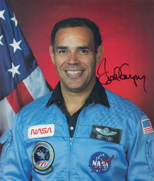 Frederick Gregory Autograph on a NASA (8 x 10") co: Frederick Gregory Autograph on a NASA (8 x 10") color publicity lithograph of the astronaut in his flight suit. Excellent condition.