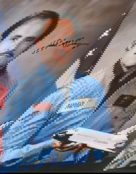John Lounge Autograph on a NASA color lithograph (: John Lounge Autograph on a NASA color lithograph (8 x 10"). Lounge also flew on STS-26 and STS-35.