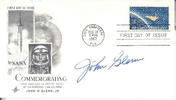 Mercury 6 Glenn Autographed Project Mercury Stamp: The first day of issue cover bears a black and white cachet comemmorating Glenn's orbital flight, and the special 4-cent Project Mercury stamp that had been designed and printed in secret by the US Po