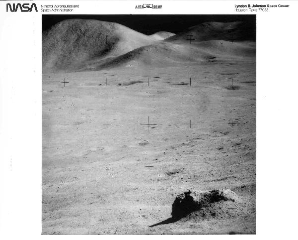 Apollo 15 Lot of 7 NASA Black #'d Photographs: Lot of 7 NASA black and white black #"d photographs printed on Kodak paper (8 x 10") including AS15-90-12187 this photo was taken from the slope of Hadley Delta Mountain, AS15-89-12100 a telephoto len