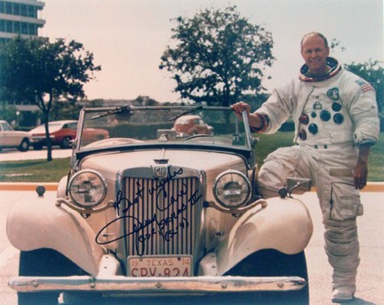 Skylab 4, Gerald Carr Autograph: on a color NASA publicity photograph (8x10") of the Skylab commander in his white space suit standing next to an MG. Inscribed "Best wishes, Jerry Carr, CDR/Skylab III, (SL-4)". Nice portrait.