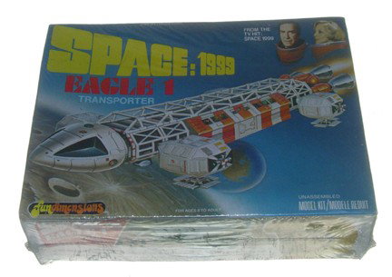 Fun Dimensions Space Eagle 1 Transporter Model Kit: 1978 Space 1999 Eagle 1 Transporter. Kit #: 1-1901, Box has light crushing due to contracting of original shrink wrap. Assumed mint condition still in original shrink wrap.