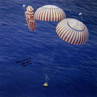 Apollo 15 Astronaut David Scott Autograph: Apollo Astronaut David Scott Autographs on a (20.5 x 20.5") photograph of the Apollo 15 capsule landing and on a (16.5 x 20.5") photograph of the Apollo 15 launch. Bold signatures.