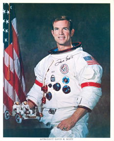 Apollo 15 David Scott Autograph: on a color (8x10") NASA publicity photograph of the astronaut in his white space suit. Signed in fine black Sharpie. Excellent condition.