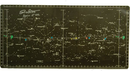 David Scott Autograph: David Scott Autograph on Apollo 15 CSM Translunar Coast Star Chart (15.75x8") This chart has a black background and white printing of the constellations and shows the CSM's orbital path in yellow and