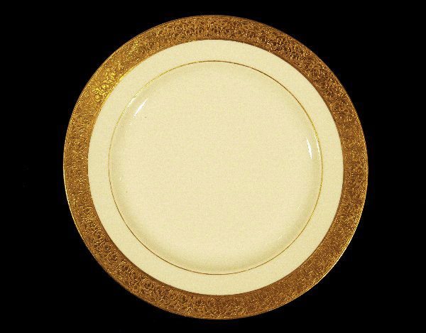 Hutschenreuther Fine China Dessert Plate: Hutschenreuther Bavarian Fine China - Eleven Dessert/Salad plates. These 8" white bone china plates feature a 1/2" patterned gold edge trim. Slight imperfections in the gold trim do not detract. Elega