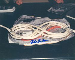 Gemini GT 8 David Scott Autographs: on each of two NASA color photographs (8 x 10") depicting an umbilical rack and flight stowage tether for the Gemini 8 spacecraft. Good condition with minor faults. Ex: the Dave Scott collection.