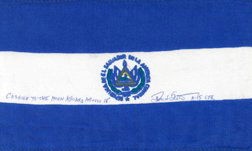 Apollo 15 Flown El Salvador Flag Carried to Moon: (4 x 6") David Scott has written in blue ink on the flag: "Carried to the Moon aboard Apollo 15" Dave Scott A-15 CDR". Professionally matted and framed (to 16 x 20") with a photograph of David Scott i