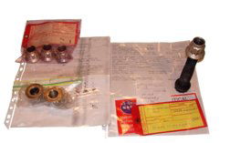 Flown STS 96 Discovery Engine Gimbal Bolt: Lot consists of flight hardware including bolt (5 x 2 x 2") with PN MD111-4035-0001 and nut (2" diameter and 1" tall) PN MD111-43007-0014 were used for 4 flights and replaced as per operating plan all