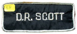 Apollo 9 David Scott's Nametag: Apollo 9 Astronaut David Scott's Nylon Spacesuit Nametag. This embroidered nametag (2 x 5") is made of Nylon. The use of nylon dates prior to the Beta cloth requirement. Rare. From the collection of W