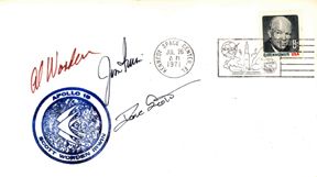 David Scott, Alfred Worden and Jamecs Irwin Autog: on a post card autographed bearing an Apollo 15 mission emblem cachet. This cover has a Kennedy Space Center cancel dated Jul 26, 1971. Worden autographed in brown ink, Irwin and Scott autographed in