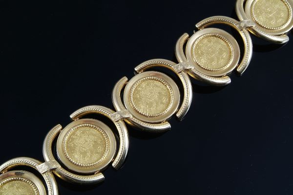 An Austrian coin bracelet, set along the length w