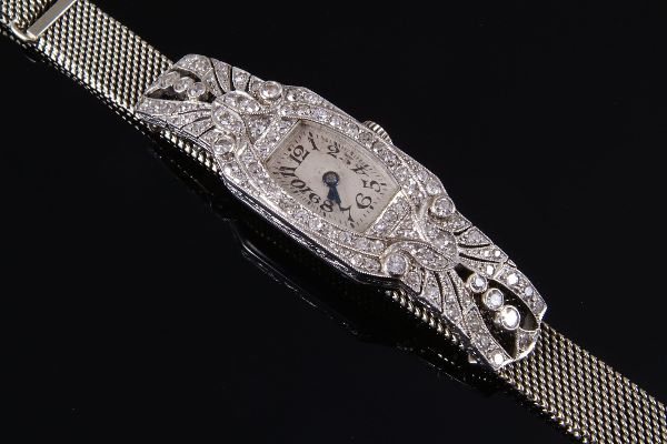 A lady's Art Deco diamond set wrist watch, circa 