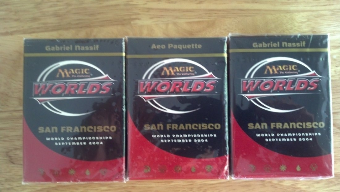 MAGIC THE GATHERING (3) SEALED 2004 DECK BOXES: 3 2004 DECK BOXES - SEALED. THESE ARE FROM 2004 WORLD SERIES. YOU WILL RECEIVE 2 SEALED DECKS OF QUARTERFINALIST GABRIEL NASIFF AND - AND THIS IS THE KICKER FOR THIS LOT - AS IF IT WASNT SWEET ENOUGH.