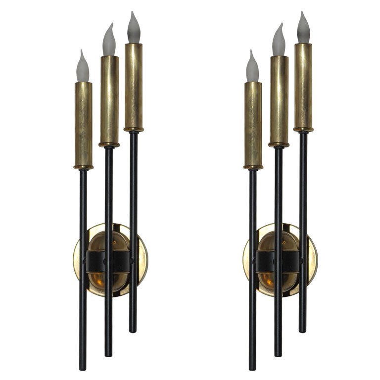 Pair of French 1950's sconces: A chic pair of three-light sconce in patinated and gilt metal. French, mid 20th c. 18.5''H