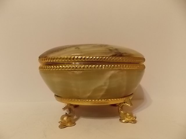 Antique marble/stone And brass footed trinket box: Antique marble/stone And brass trinket box w/dolphin figure designed feet. 5" x 2.5".