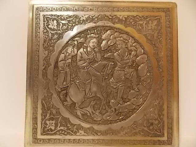 Antique plated silver trinket box: Antique plated silver trinket box w/ etched figures on lid depicting men on horse and foot traveling. 5" x 5" x 1".