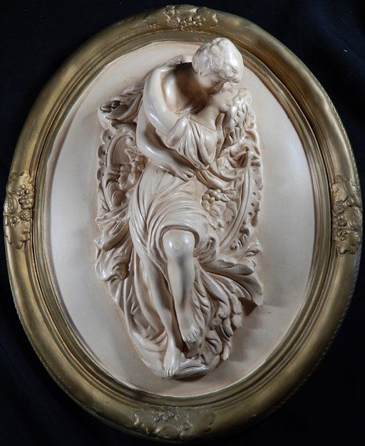 Pair of Plaster Victorian Wall Plaques: Pair of Victorian plaster plaques depicting a couple kissing.
