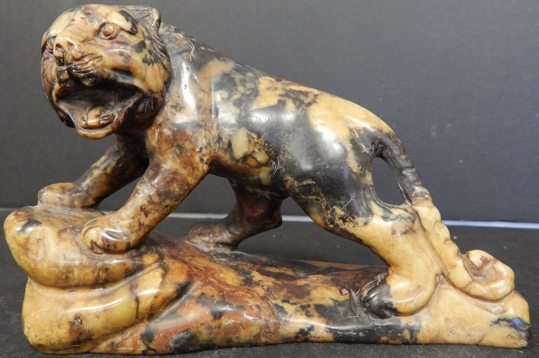 SOAPSTONE TIGER SCULPTURE: 5.25" X 4" GOOD CONDITION WE DO NOT SHIP. PLEASE CONTACT A SHIPPING CENTER OF YOUR CHOICE USING ZIP CODE LOCATION 33460. CHECK OUR WEBSITE FOR MORE DETAILS & UPDATES.