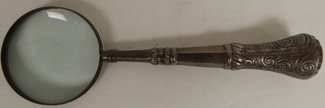 ANTIQUE PLATED MAGNIFING GLASS: 12" X 3" X 2" GOOD CONDITION. WE DO NOT SHIP. PLEASE CONTACT A SHIPPING CENTER OF YOUR CHOICE USING ZIP CODE LOCATION 33460. CHECK OUR WEBSITE FOR MORE DETAILS & UPDATES.