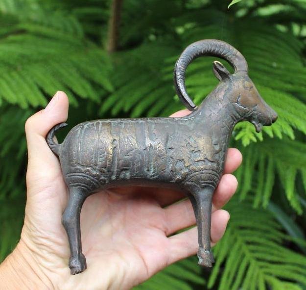 Middle Eastern antique bronze goat- 10 warriors & tiger: Middle Eastern antique bronze goat with 10 warriors fighting with 2 tigers. Length: 6.5 in. = 17 cm. Height 6.5 in. = 16 cm. Weight: 1 lb. 70z = 630 g Condition: Normal age wear and patina: Low Estima