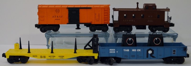 Lionel AT&SF 63132 Operating Box Car, 2357 Caboose, 260: Lionel AT&SF 63132 Operating Box Car, 2357 Caboose, 26087 Gondola Car, 16375 Flat bed car.