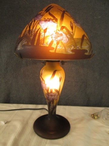 AFTER GALLE FRENCH SIGNED CAMEO GLASS 18" LAMP: 18" TALL DOUBLE BULB LAMP, POND SCENE, WITH CATTAILS, SIGNED GALLE ON BASE AND SHADE ALSO ARTIST SIGNED ON BASE SHADES OF GOLD, BROWN, PURPLE, ETC, 15 WATT BULBS MAX.