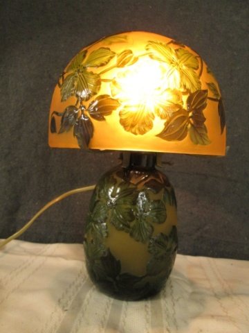 AFTER GALLE FRENCH SIGNED CAMEO GLASS 11.5" LAMP: 11.5" TALL LAMP SIGNED GALLE, FLORAL ART NOUVEAU DESIGN SHADES OF GREEN, GOLD, ETC, 15 WATT BULBS MAX.