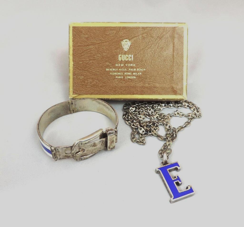 GUCCI BRACELET AND NECKLACE: WITH ORIGINAL BOX BLUE ENAMELED PENDANT ON SILVER GUCCI LINK CHAIN WITH BELT LOOK HINGED BRACELET IN WHITE AND BLUE ENAMELED STRIPES