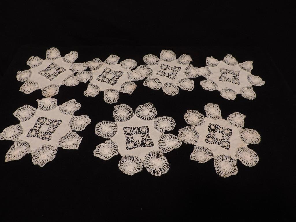 A GROUPS OF SMALL LACE DOILIES