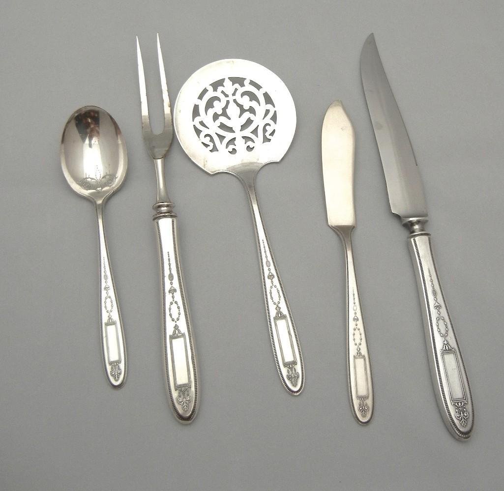 5 MISC.: NO RESERVE.....1 TOMATO SERVER 1 SUGAR SPOON 1 DINER KNIFE 1 MASTER BUTTER KNIFE 1 CARVING FORK