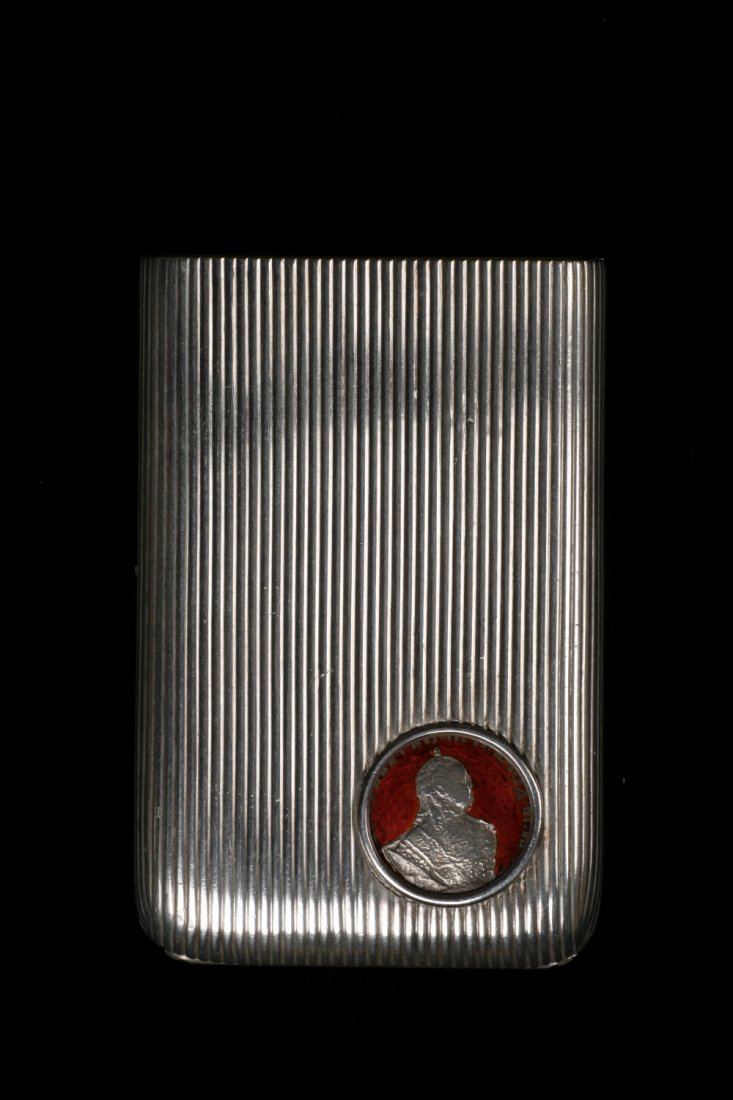 FABERGE: AN ART DECO STYLE RUSSIAN SILVER CIGARETTE CAS: FABERGE: AN ART DECO STYLE RUSSIAN SILVER CIGARETTE CASE, set with a red enamel and silver coin, stamped '88' and Faberge marks, 3". See illustration¦¦Provenance: Private collection, Dorset.¦