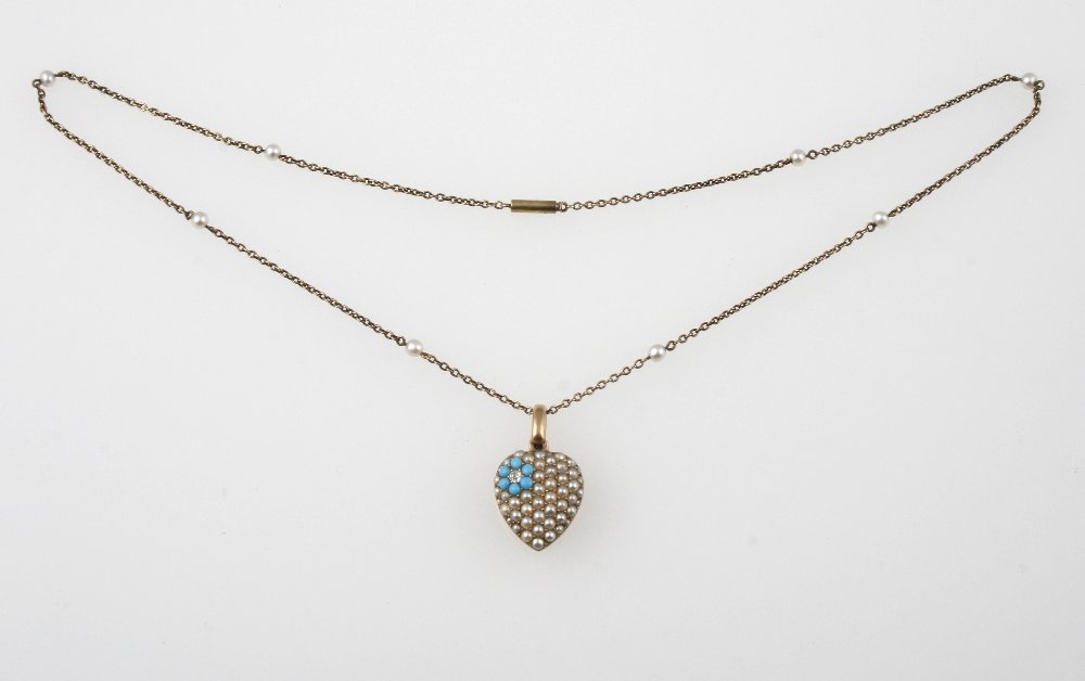 A VICTORIAN HEART-SHAPED PENDANT, pave-set overall with: A VICTORIAN HEART-SHAPED PENDANT, pave-set overall with seed pearls and a turquoise and diamond cluster forming a flowerhead design, the unmarked yellow gold reverse with circular locket aperture, 1.7