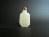 A Qing Dynasty White Jade Snuff Bottle