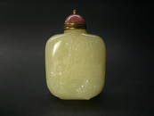 A Qing Dynasty Carved Jade Snuff Bottle