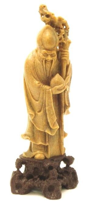 A Fine Soapstone carving of Shou Lao: A fine soapstone carving of Shou Lao rnrnProvenance: Bonhams Auction rnrnHeight: 31cm