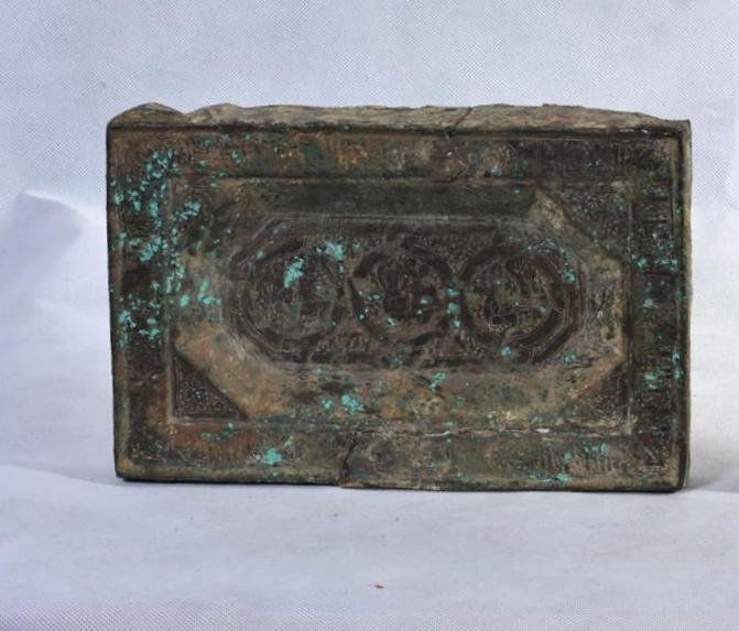 A VERY RARE EARLY ISLAMIC SELJUK SILVER AND COPPER PLAQ: A Very Rare Early Islamic Seljuk Silver and Copper Plaque With engraved Human Face Bird and Kufic Inscription Circa: 10th to 12th Century AD Size: 29cm X 18cm