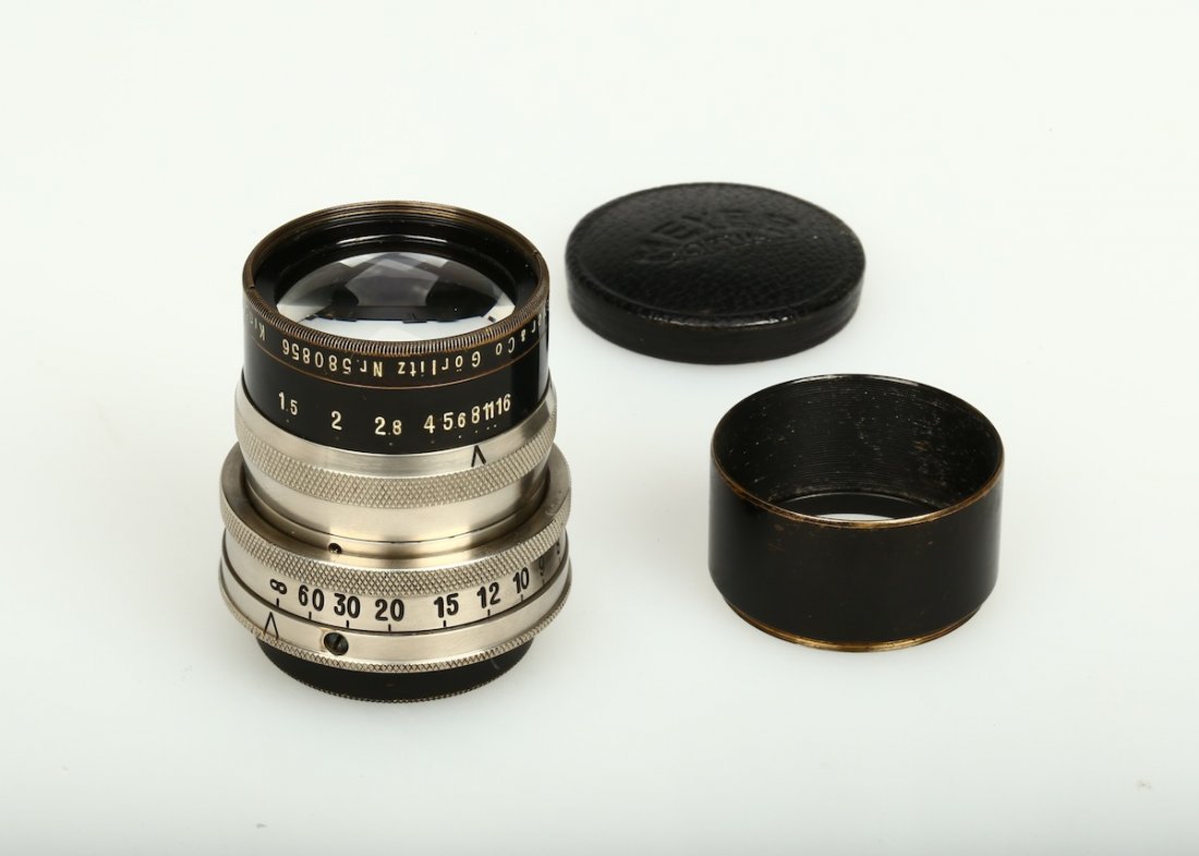 Hugo Meyer & Co-Goerlitz Kino Plasmat 1.5/5cm: SERIAL NO. 580856, N/A This is an early version before WWII, without coating. Lens made of nickel and in black paint, with original M39 mount, in mint condition. It comes with both caps and hood, with