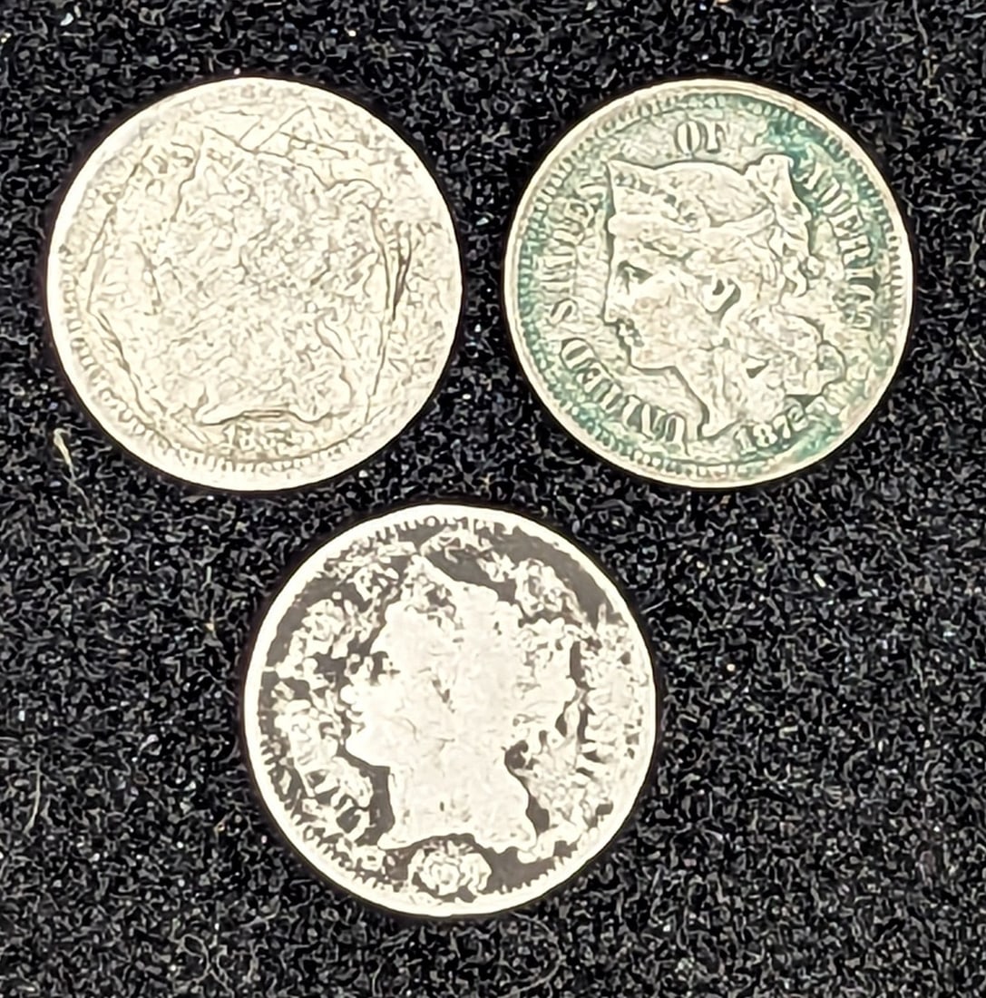 Three Nickel Three cent piece coins (1 of 2)