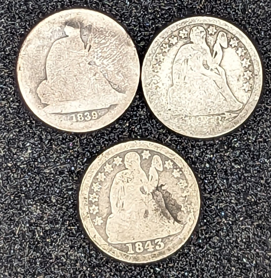 Three silver Seated Liberty dime coins (1 of 2)