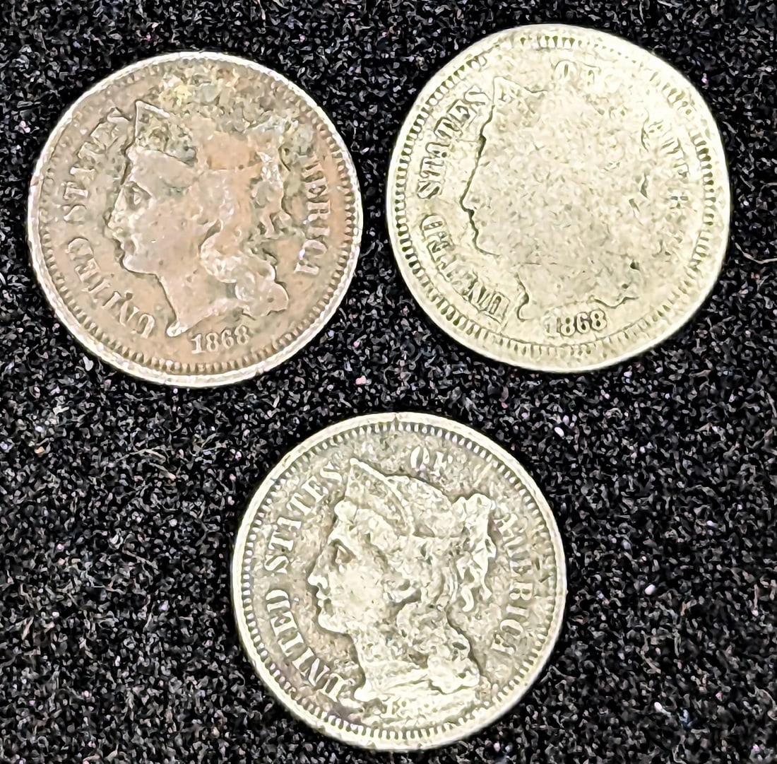 Three Nickel Three cent piece coins (1 of 2)