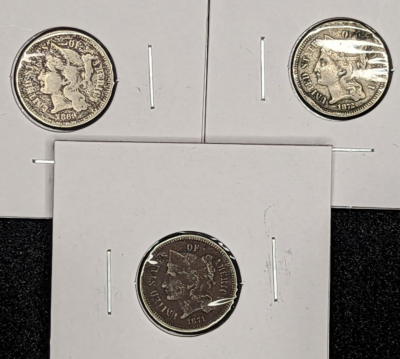 Three Nickel Three cent piece coins (1 of 2)