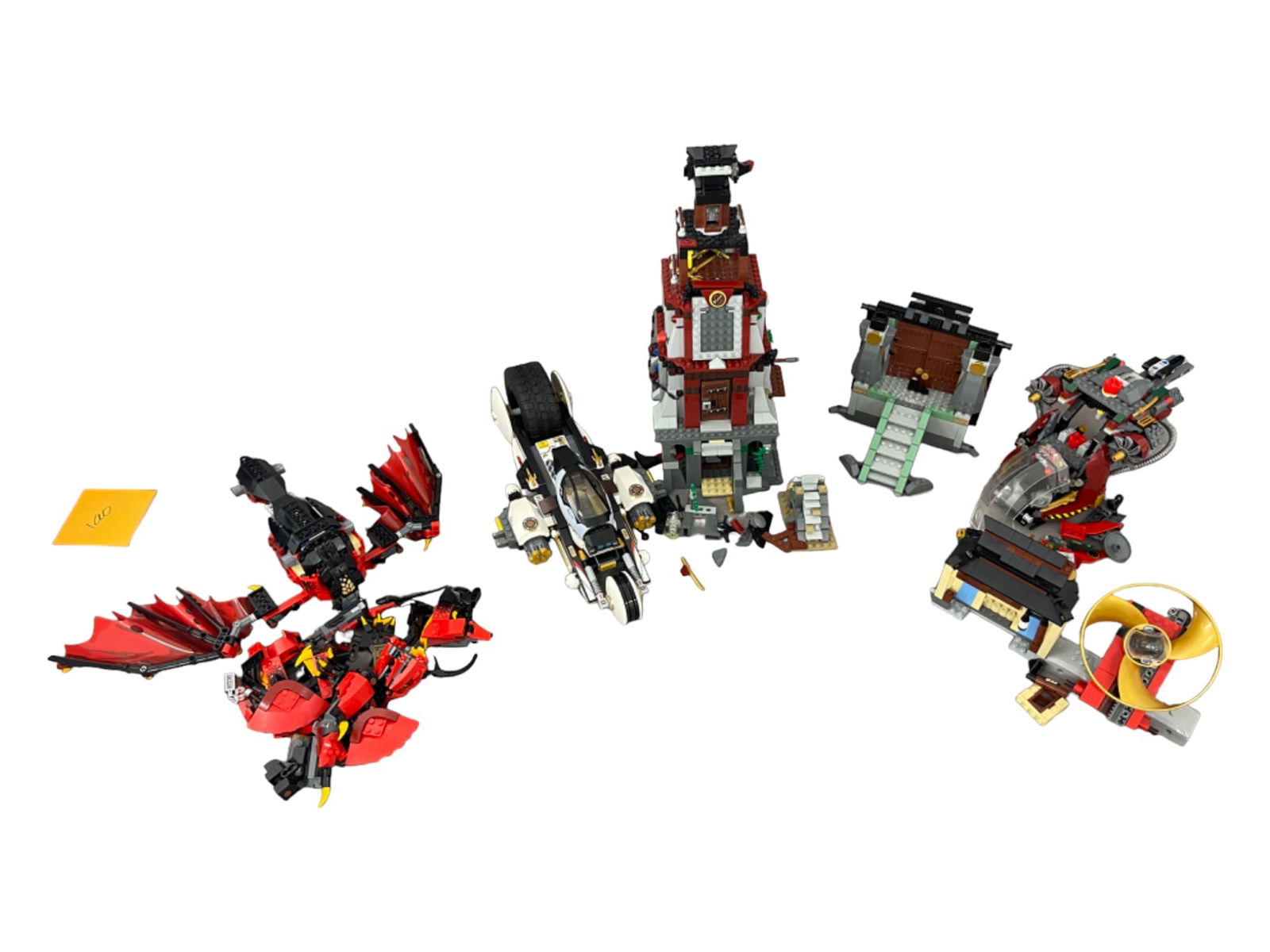LEGO Ninjago Castle, Ultra Stealth Raider, Battle Grounds and More Collection Lot: LEGO Ninjago Castle, Ultra Stealth Raider, Battle Grounds and More Collection Lot. Some pieces need to be reassembled.