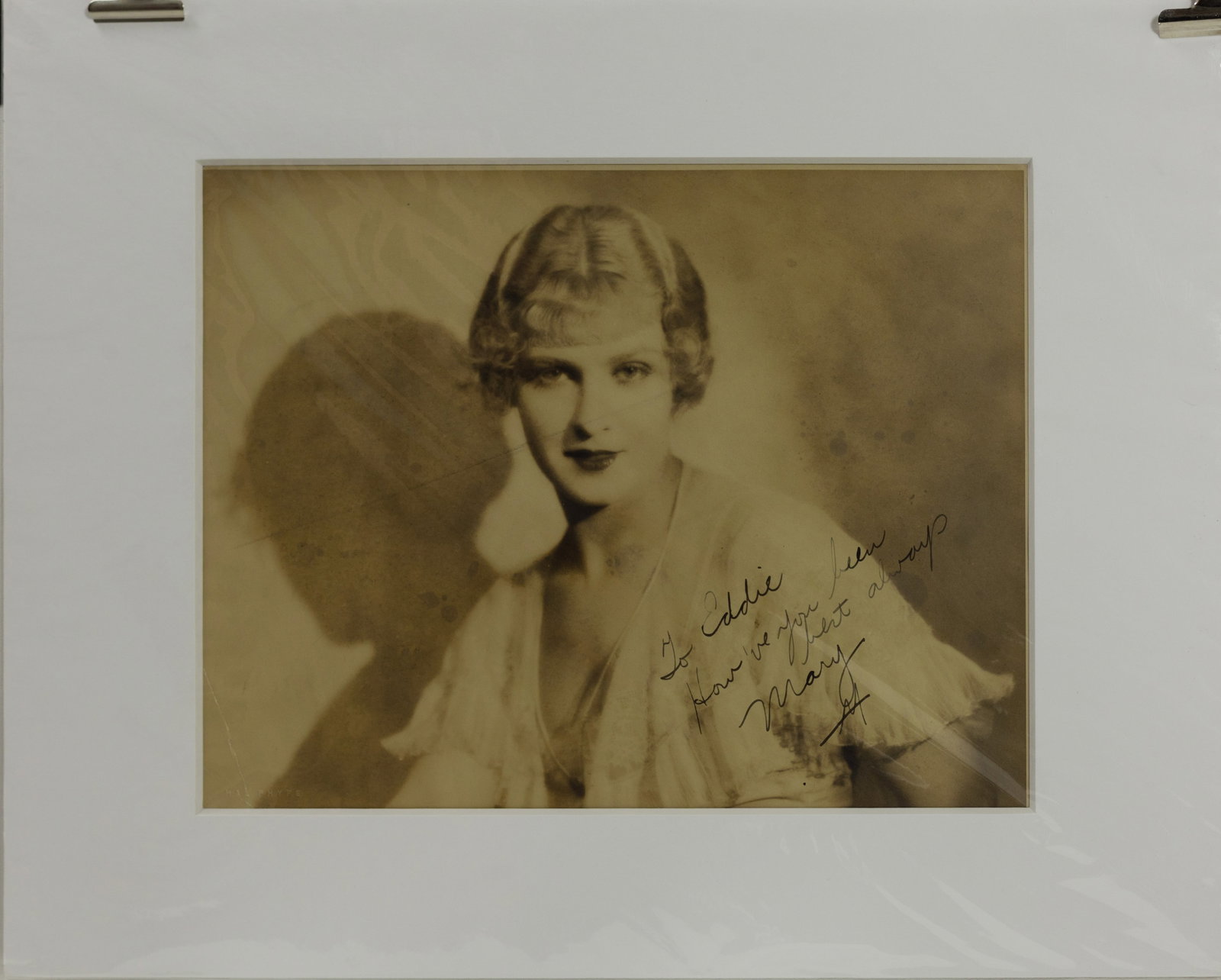 1920s Signed Movie Actress Photo by Hal Phyfe Embossed Lower Left Signed by Actress Lower Right: 1920s Signed Movie Actress Photo by Hal Phyfe Embossed Lower Left Signed by Actress Lower Right. Photographer Stamp on Back. 20" x 16".