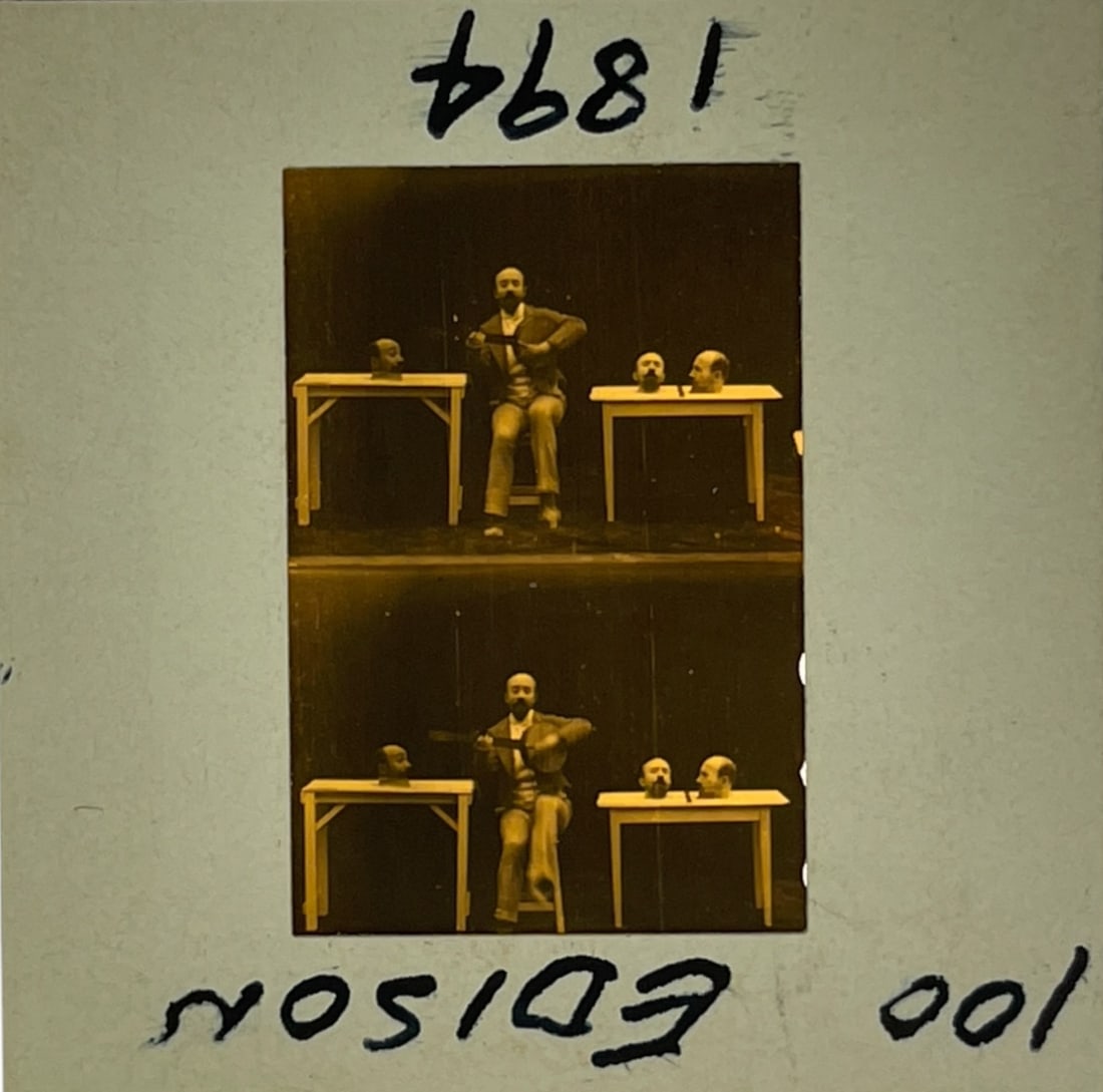 The Magician 1894 Thomas Edison American silent film negative Slide: he Magician is a 1894 American silent film produced by Thomas A. Edison's Edison Manufacturing Company. According to the Edison film catalog, the film originally was sold to theaters for $9.00. This f